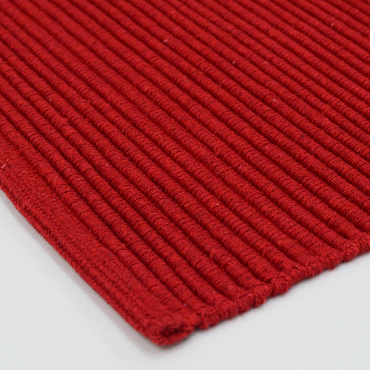 Alfombra playera IC10395 roja, detalle del tejido